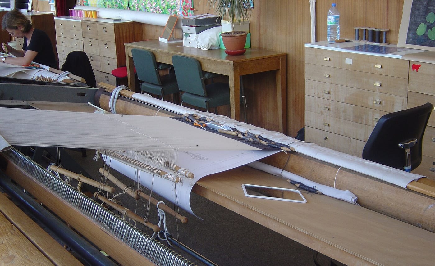 A low-warp tapestry loom at the Gobelins manufacture in Paris with the warp held under high even tension